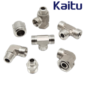 A pile of stainless steel hydraulic fittings